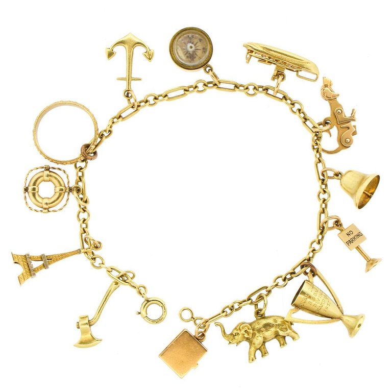 Whimsical 14 Karat Yellow Gold Charm Bracelet