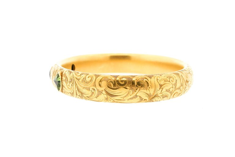 Art Nouveau Engraved 14 Karat Gold Peridot Hollow Form Bangle Bracelet